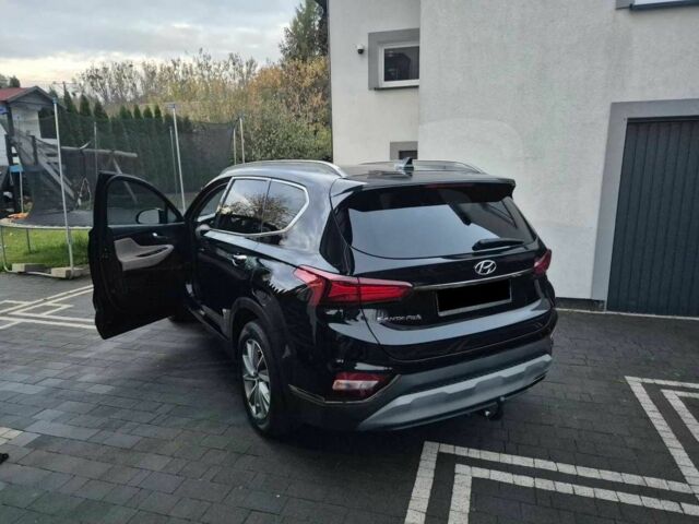 Черный Хендай Санта Фе, объемом двигателя 2.4 л и пробегом 105 тыс. км за 11200 $, фото 2 на Automoto.ua