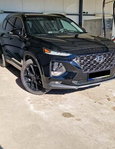 Черный Хендай Санта Фе, объемом двигателя 2.36 л и пробегом 152 тыс. км за 23700 $, фото 3 на Automoto.ua