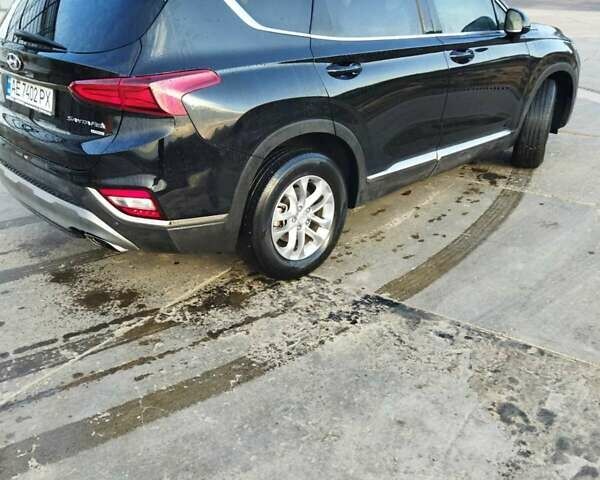 Чорний Хендай Санта Фе, об'ємом двигуна 2.4 л та пробігом 100 тис. км за 25000 $, фото 4 на Automoto.ua