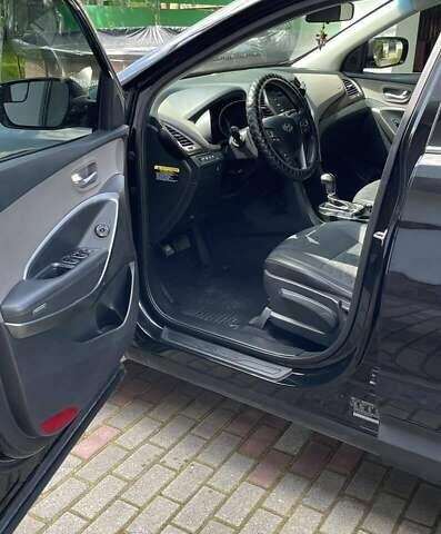 Черный Хендай Санта Фе, объемом двигателя 2.36 л и пробегом 125 тыс. км за 16700 $, фото 8 на Automoto.ua