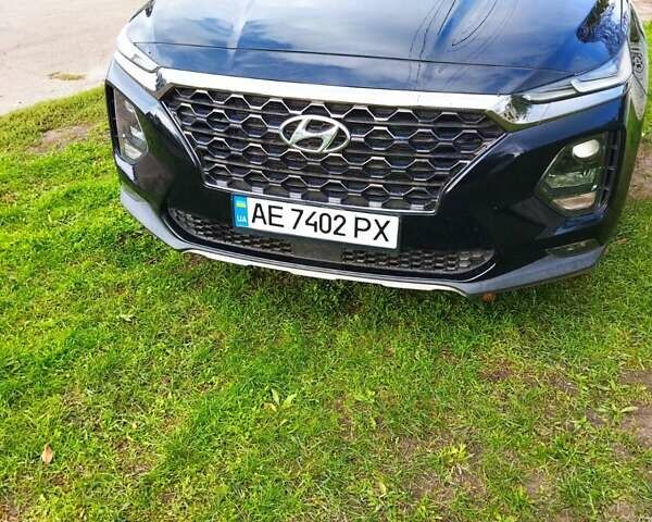 Чорний Хендай Санта Фе, об'ємом двигуна 2.4 л та пробігом 100 тис. км за 25000 $, фото 2 на Automoto.ua