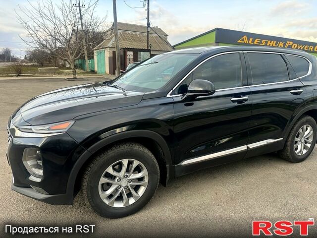 Чорний Хендай Санта Фе, об'ємом двигуна 2.4 л та пробігом 99 тис. км за 25000 $, фото 3 на Automoto.ua