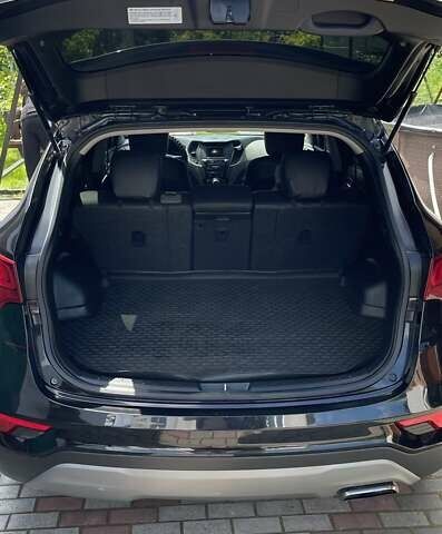 Черный Хендай Санта Фе, объемом двигателя 2.36 л и пробегом 125 тыс. км за 16700 $, фото 6 на Automoto.ua