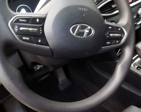 Чорний Хендай Санта Фе, об'ємом двигуна 2.4 л та пробігом 100 тис. км за 25000 $, фото 3 на Automoto.ua