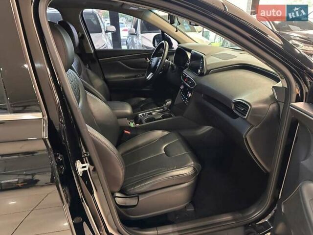 Чорний Хендай Санта Фе, об'ємом двигуна 2 л та пробігом 77 тис. км за 27500 $, фото 21 на Automoto.ua