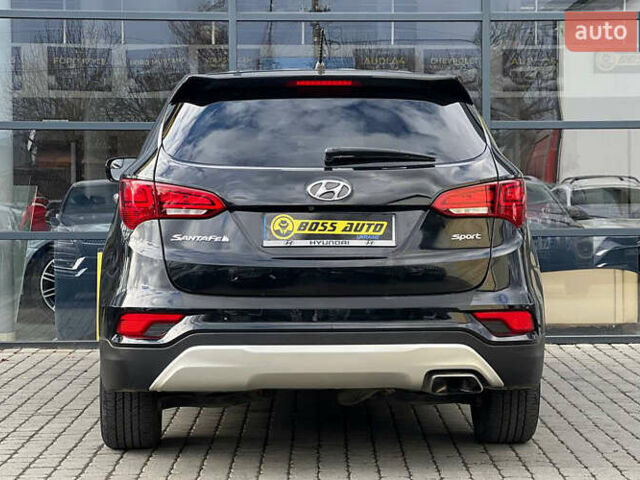 Черный Хендай Санта Фе, объемом двигателя 2.36 л и пробегом 130 тыс. км за 16300 $, фото 3 на Automoto.ua