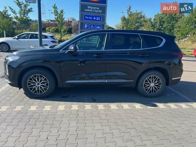 Черный Хендай Санта Фе, объемом двигателя 2.36 л и пробегом 80 тыс. км за 19999 $, фото 3 на Automoto.ua