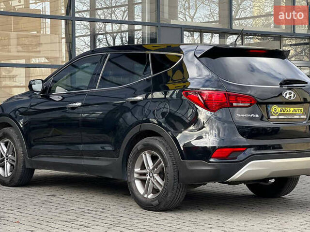 Черный Хендай Санта Фе, объемом двигателя 2.36 л и пробегом 130 тыс. км за 16300 $, фото 5 на Automoto.ua