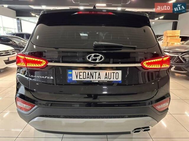 Чорний Хендай Санта Фе, об'ємом двигуна 2 л та пробігом 77 тис. км за 27500 $, фото 4 на Automoto.ua