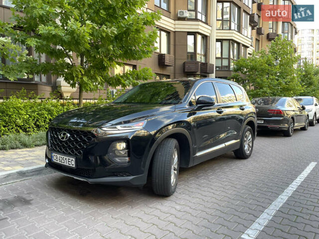 Черный Хендай Санта Фе, объемом двигателя 2.36 л и пробегом 45 тыс. км за 20500 $, фото 1 на Automoto.ua