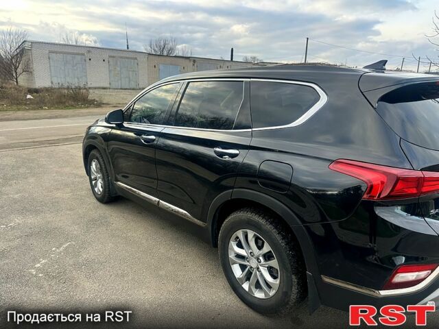 Чорний Хендай Санта Фе, об'ємом двигуна 2.4 л та пробігом 99 тис. км за 25000 $, фото 4 на Automoto.ua