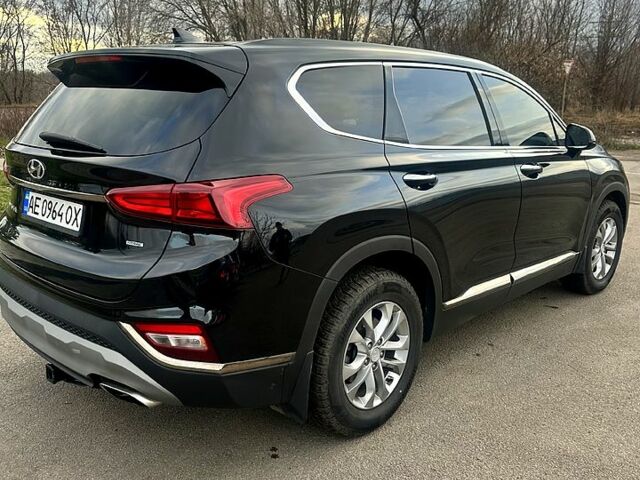 Чорний Хендай Санта Фе, об'ємом двигуна 2.4 л та пробігом 99 тис. км за 25000 $, фото 6 на Automoto.ua