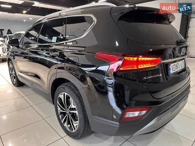 Чорний Хендай Санта Фе, об'ємом двигуна 2 л та пробігом 77 тис. км за 27500 $, фото 5 на Automoto.ua