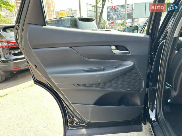 Чорний Хендай Санта Фе, об'ємом двигуна 2 л та пробігом 111 тис. км за 27500 $, фото 34 на Automoto.ua
