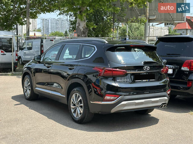 Чорний Хендай Санта Фе, об'ємом двигуна 2 л та пробігом 111 тис. км за 27500 $, фото 7 на Automoto.ua