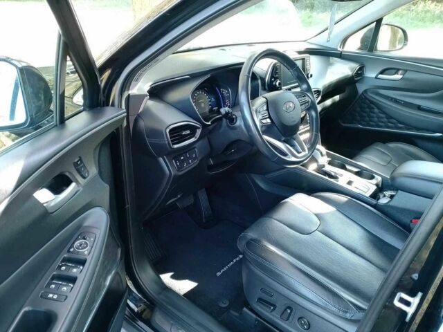 Черный Хендай Санта Фе, объемом двигателя 2.4 л и пробегом 106 тыс. км за 11999 $, фото 2 на Automoto.ua