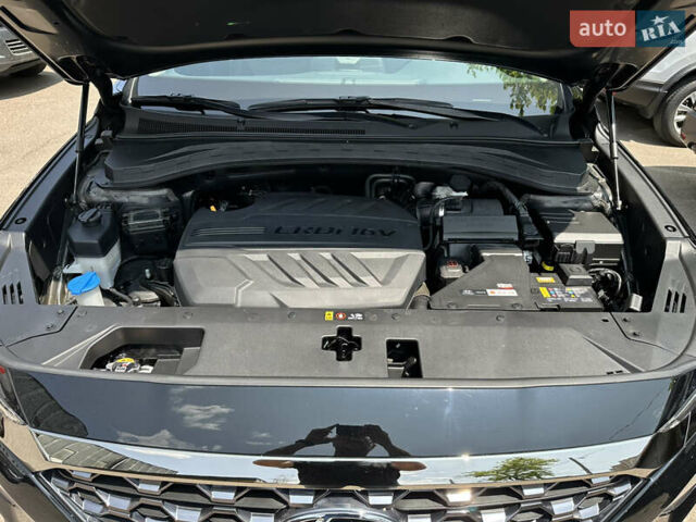 Чорний Хендай Санта Фе, об'ємом двигуна 2 л та пробігом 111 тис. км за 27500 $, фото 13 на Automoto.ua