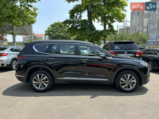 Чорний Хендай Санта Фе, об'ємом двигуна 2 л та пробігом 111 тис. км за 27500 $, фото 5 на Automoto.ua