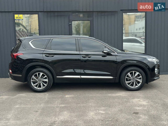 Черный Хендай Санта Фе, объемом двигателя 2 л и пробегом 72 тыс. км за 24500 $, фото 5 на Automoto.ua