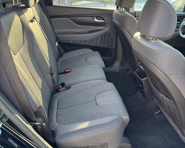 Черный Хендай Санта Фе, объемом двигателя 2.4 л и пробегом 49 тыс. км за 23000 $, фото 16 на Automoto.ua