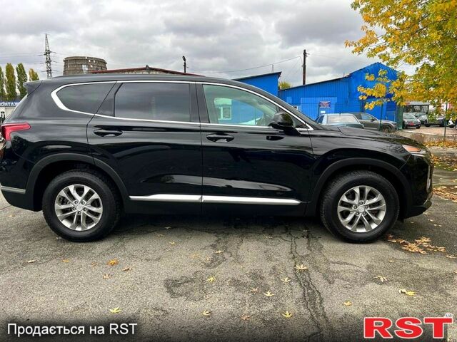 Чорний Хендай Санта Фе, об'ємом двигуна 2.4 л та пробігом 150 тис. км за 19900 $, фото 7 на Automoto.ua