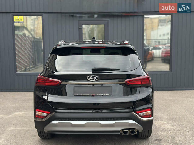 Черный Хендай Санта Фе, объемом двигателя 2 л и пробегом 72 тыс. км за 24500 $, фото 1 на Automoto.ua