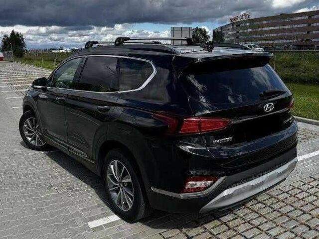 Черный Хендай Санта Фе, объемом двигателя 2.5 л и пробегом 95 тыс. км за 12700 $, фото 1 на Automoto.ua