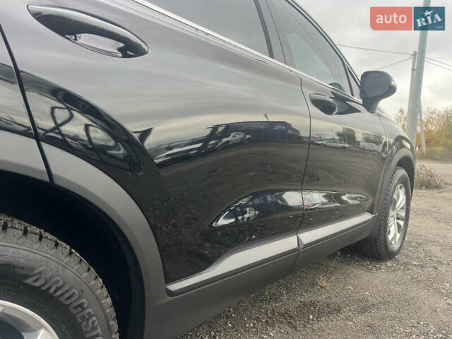 Черный Хендай Санта Фе, объемом двигателя 2.5 л и пробегом 15 тыс. км за 29000 $, фото 15 на Automoto.ua