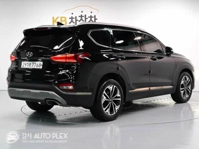 Черный Хендай Санта Фе, объемом двигателя 2 л и пробегом 105 тыс. км за 17000 $, фото 2 на Automoto.ua