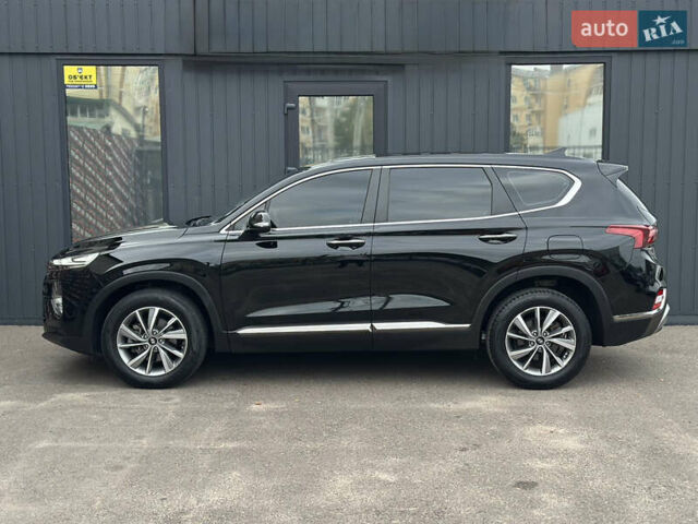 Черный Хендай Санта Фе, объемом двигателя 2 л и пробегом 72 тыс. км за 24500 $, фото 4 на Automoto.ua