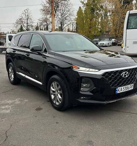 Черный Хендай Санта Фе, объемом двигателя 2.36 л и пробегом 150 тыс. км за 19900 $, фото 2 на Automoto.ua
