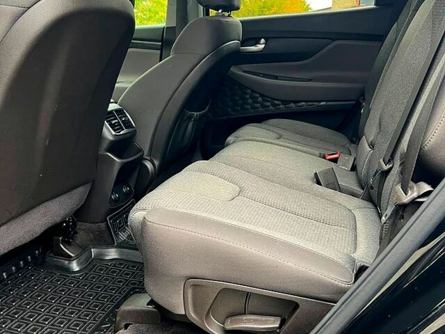 Чорний Хендай Санта Фе, об'ємом двигуна 2.4 л та пробігом 150 тис. км за 19900 $, фото 13 на Automoto.ua