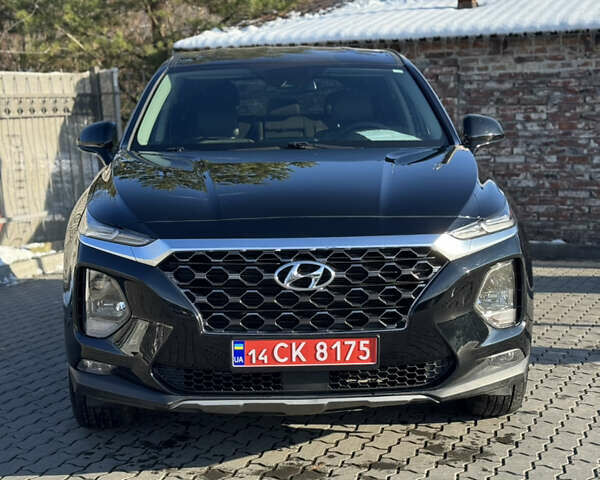 Черный Хендай Санта Фе, объемом двигателя 2.4 л и пробегом 49 тыс. км за 23000 $, фото 3 на Automoto.ua