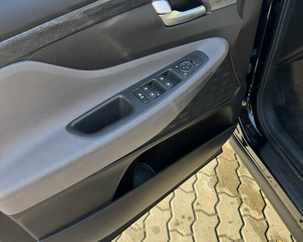 Черный Хендай Санта Фе, объемом двигателя 2.4 л и пробегом 49 тыс. км за 23000 $, фото 12 на Automoto.ua