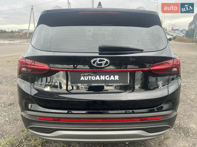 Черный Хендай Санта Фе, объемом двигателя 2.5 л и пробегом 15 тыс. км за 29000 $, фото 6 на Automoto.ua