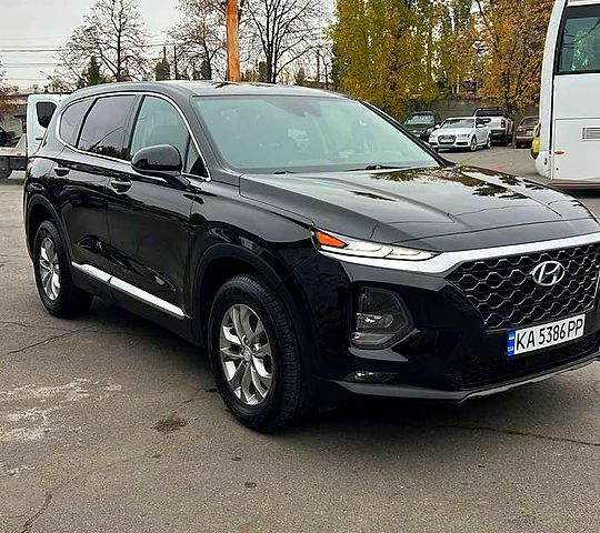 Чорний Хендай Санта Фе, об'ємом двигуна 2.4 л та пробігом 150 тис. км за 19900 $, фото 6 на Automoto.ua
