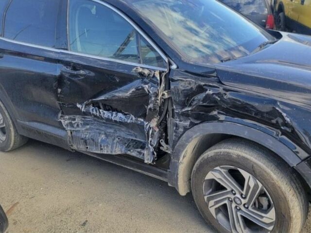 Черный Хендай Санта Фе, объемом двигателя 2.5 л и пробегом 45 тыс. км за 14700 $, фото 2 на Automoto.ua