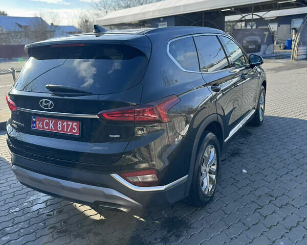 Черный Хендай Санта Фе, объемом двигателя 2.4 л и пробегом 49 тыс. км за 23000 $, фото 5 на Automoto.ua