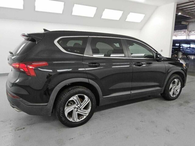 Черный Хендай Санта Фе, объемом двигателя 2.5 л и пробегом 110 тыс. км за 21000 $, фото 2 на Automoto.ua