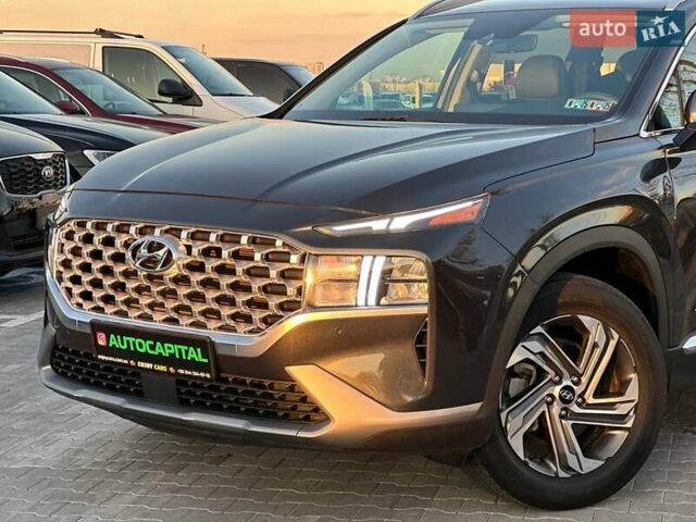 Черный Хендай Санта Фе, объемом двигателя 2.5 л и пробегом 54 тыс. км за 28990 $, фото 1 на Automoto.ua