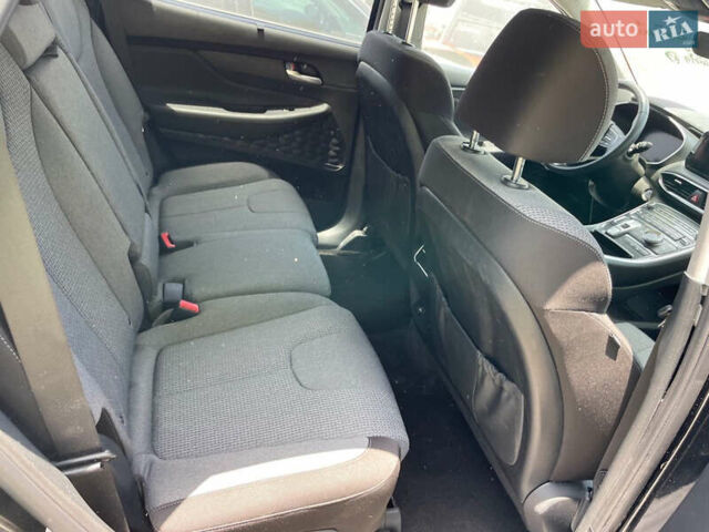 Черный Хендай Санта Фе, объемом двигателя 1.6 л и пробегом 40 тыс. км за 27000 $, фото 6 на Automoto.ua