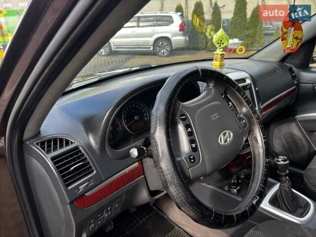 Хендай Санта Фе 2008 в Черкассах на Automoto.ua Фиолетовый Хендай Санта Фе, объемом двигателя 2.19 л и пробегом 300 тыс. км за 9188 $, фото 4 на Automoto.ua