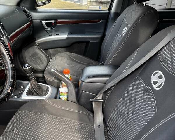 Хендай Санта Фе 2008 в Черкассах на Automoto.ua Фиолетовый Хендай Санта Фе, объемом двигателя 2.19 л и пробегом 300 тыс. км за 9188 $, фото 5 на Automoto.ua