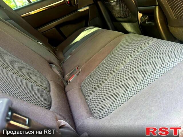 Хендай Санта Фе 2013 в Ахтырке на Automoto.ua Фиолетовый Хендай Санта Фе, объемом двигателя 2.2 л и пробегом 185 тыс. км за 11480 $, фото 6 на Automoto.ua