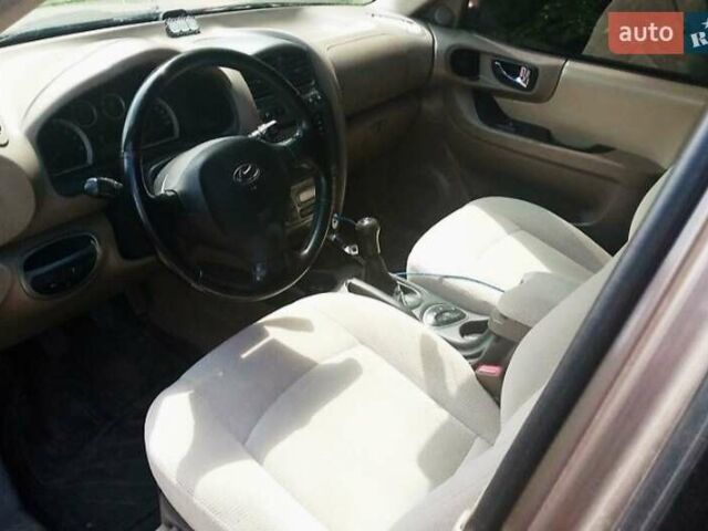 Коричневый Хендай Санта Фе, объемом двигателя 2 л и пробегом 252 тыс. км за 6200 $, фото 1 на Automoto.ua