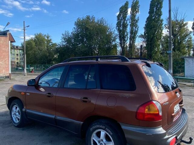 Коричневий Хендай Санта Фе, об'ємом двигуна 2 л та пробігом 250 тис. км за 3700 $, фото 2 на Automoto.ua