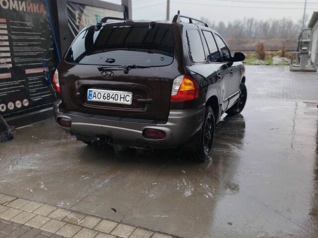 Коричневый Хендай Санта Фе, объемом двигателя 2.4 л и пробегом 270 тыс. км за 4400 $, фото 4 на Automoto.ua