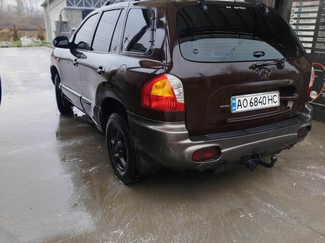 Коричневый Хендай Санта Фе, объемом двигателя 2.4 л и пробегом 270 тыс. км за 4400 $, фото 1 на Automoto.ua