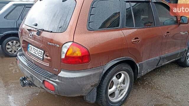 Коричневий Хендай Санта Фе, об'ємом двигуна 2 л та пробігом 375 тис. км за 6350 $, фото 2 на Automoto.ua