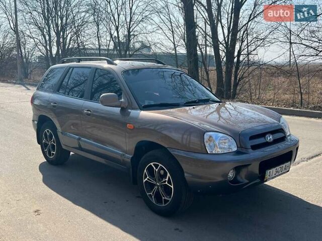 Коричневий Хендай Санта Фе, об'ємом двигуна 2 л та пробігом 130 тис. км за 7500 $, фото 2 на Automoto.ua